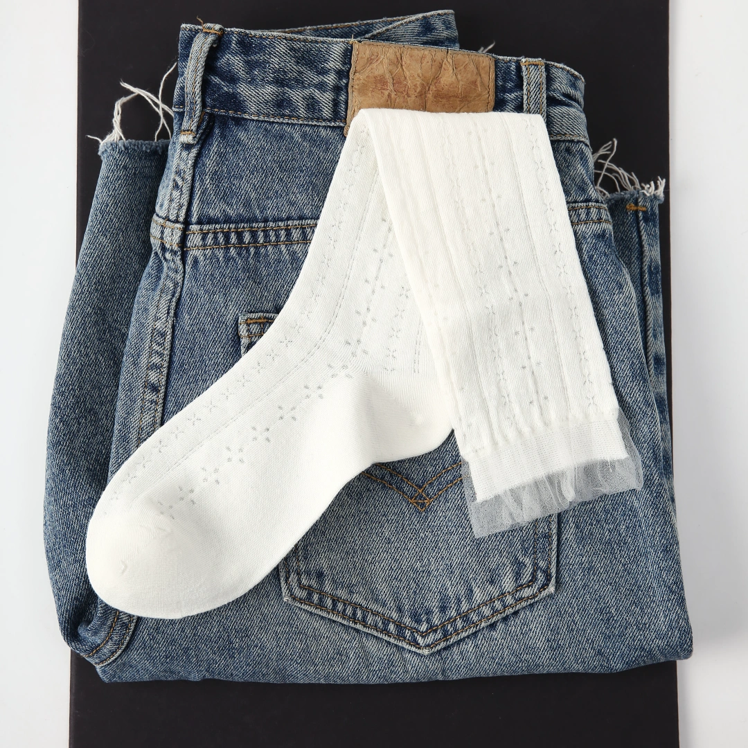 Women's Sheer Pointelle Calf Socks - product photo showing seamless stretch comfort