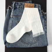 Women's Sheer Pointelle Calf Socks - product photo showing seamless stretch comfort