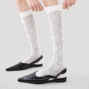 Women's Sheer Graphic Rose Calf Socks - product photo showing seamless stretch comfort