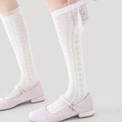 Women's Sheer Pointelle Calf Socks - product photo showing seamless stretch comfort