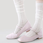 Women's Sheer Pointelle Calf Socks - product photo showing seamless stretch comfort