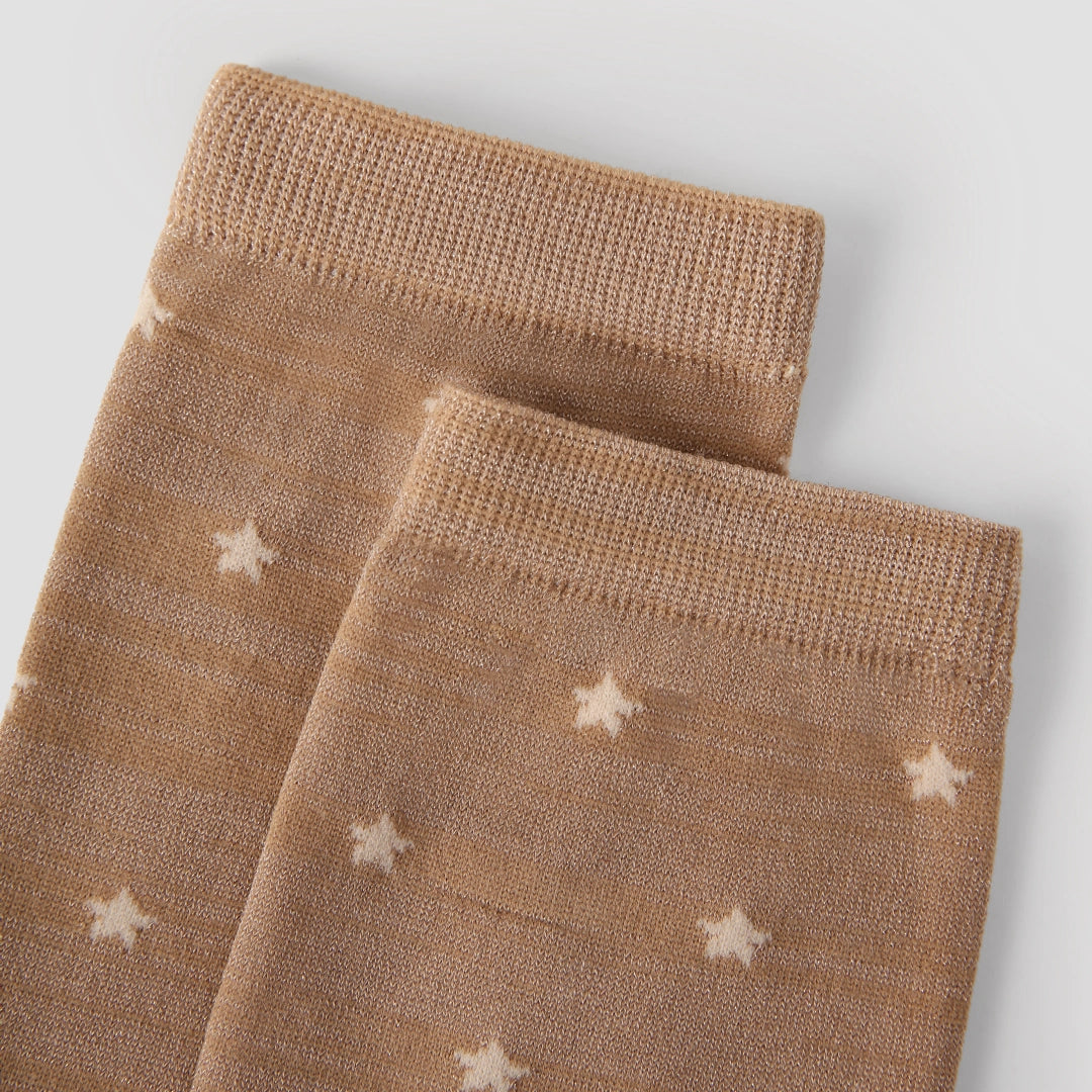 Women's Shimmer Star Knee-High Socks - product photo showing seamless stretch comfort
