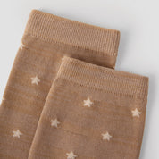 Women's Shimmer Star Knee-High Socks - product photo showing seamless stretch comfort