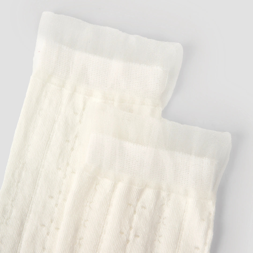 Women's Sheer Pointelle Calf Socks - product photo showing seamless stretch comfort