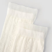 Women's Sheer Pointelle Calf Socks - product photo showing seamless stretch comfort