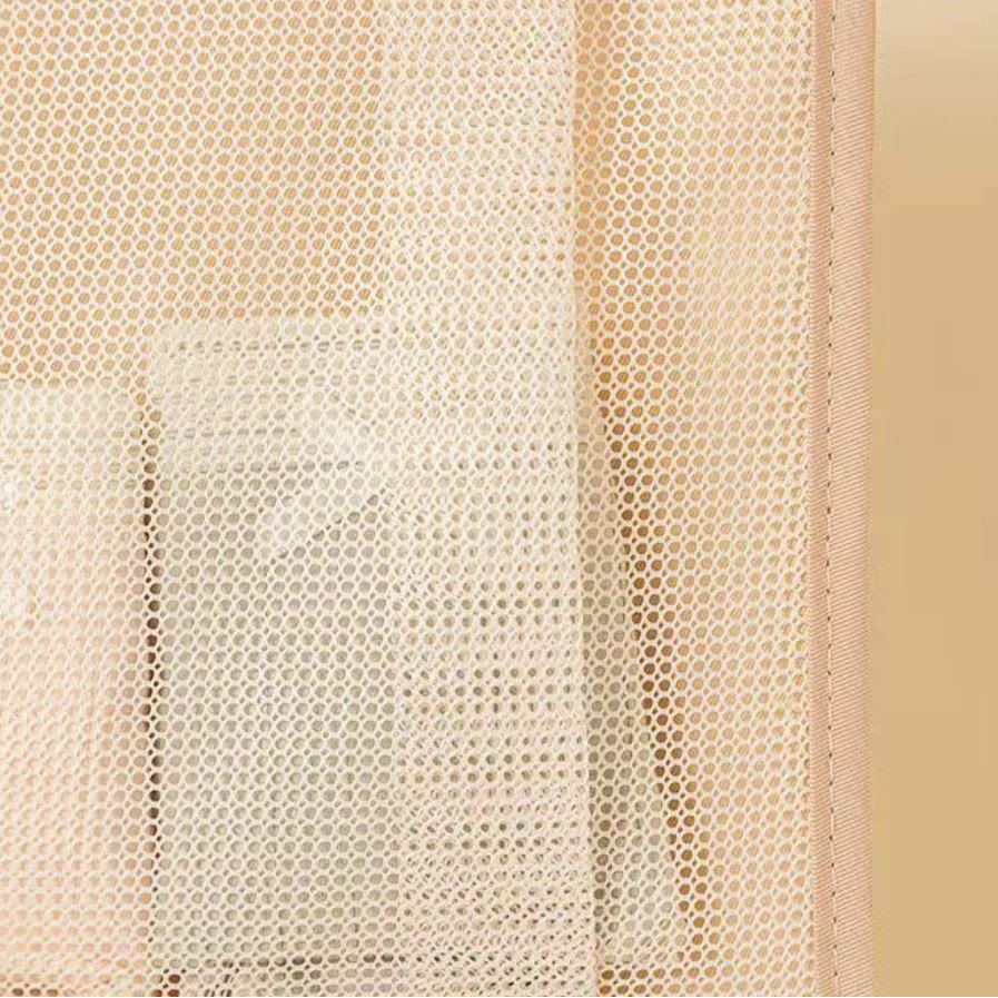 Beige mesh pouch with a beige border on a light beige background