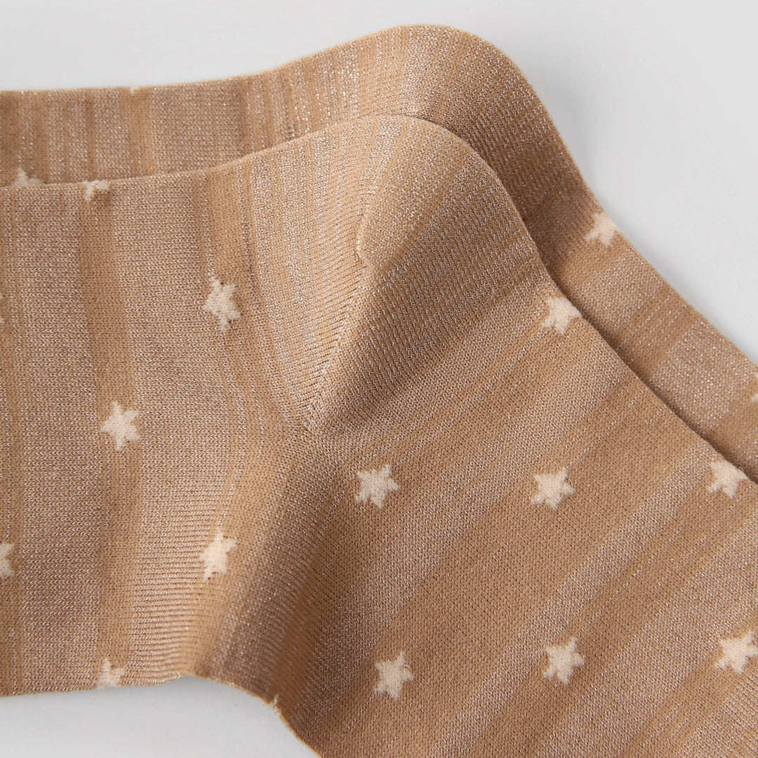 Women's Shimmer Star Knee-High Socks - product photo showing seamless stretch comfort