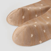 Women's Shimmer Star Knee-High Socks - product photo showing seamless stretch comfort