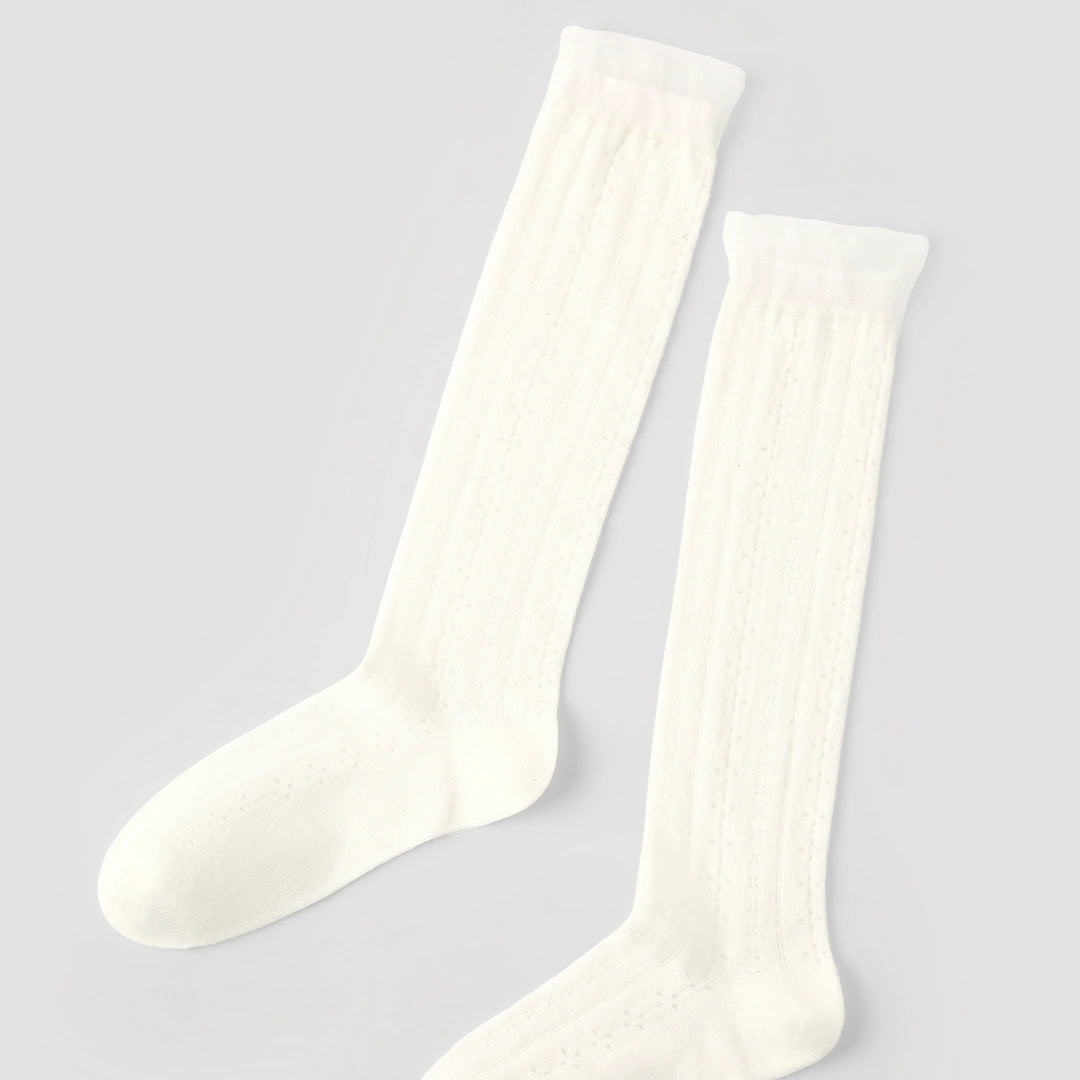 Women's Sheer Pointelle Calf Socks - product photo showing seamless stretch comfort